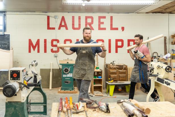 Ben Napier (C) and Jason Pickens (L) prepare to start work on building baseball bats at the Scotsman Workshop in Laurel, Mississippi. Ben chooses a piece of maple wood for his bat and Jason decides to work with a piece of ash for his bat. (action)