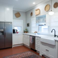 Contemporary White Kitchen with Red Patterned Rug 