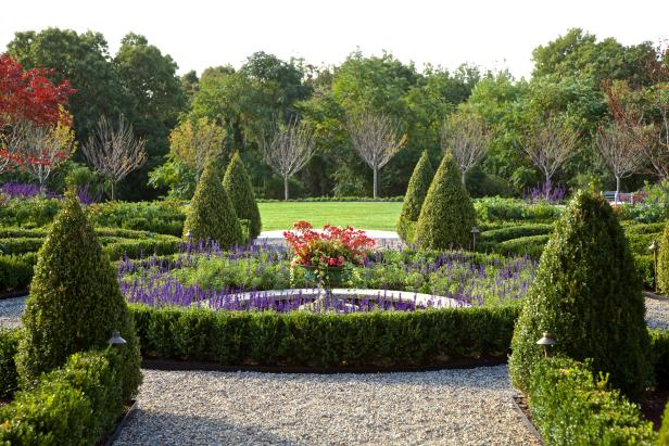 formal garden with stone fountain