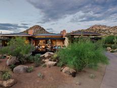 modern home with southwestern landscaping