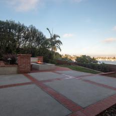 Concrete and Brick Patio With Bay View
