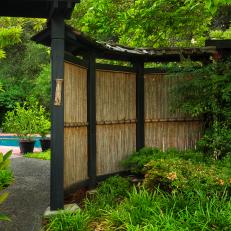 Asian Backyard With Curved Fence