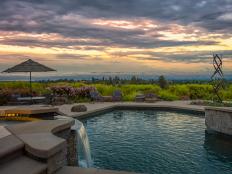 contemporary swimming pool at sunset