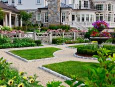 French country home with formal garden