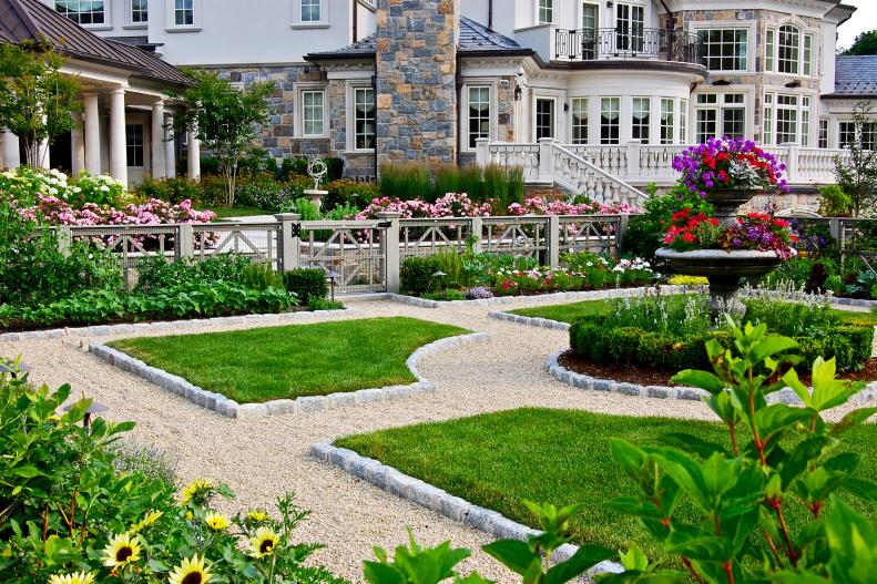 French country home with formal garden