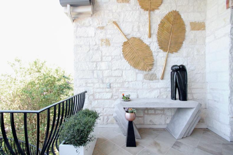 eclectic patio with stone console table