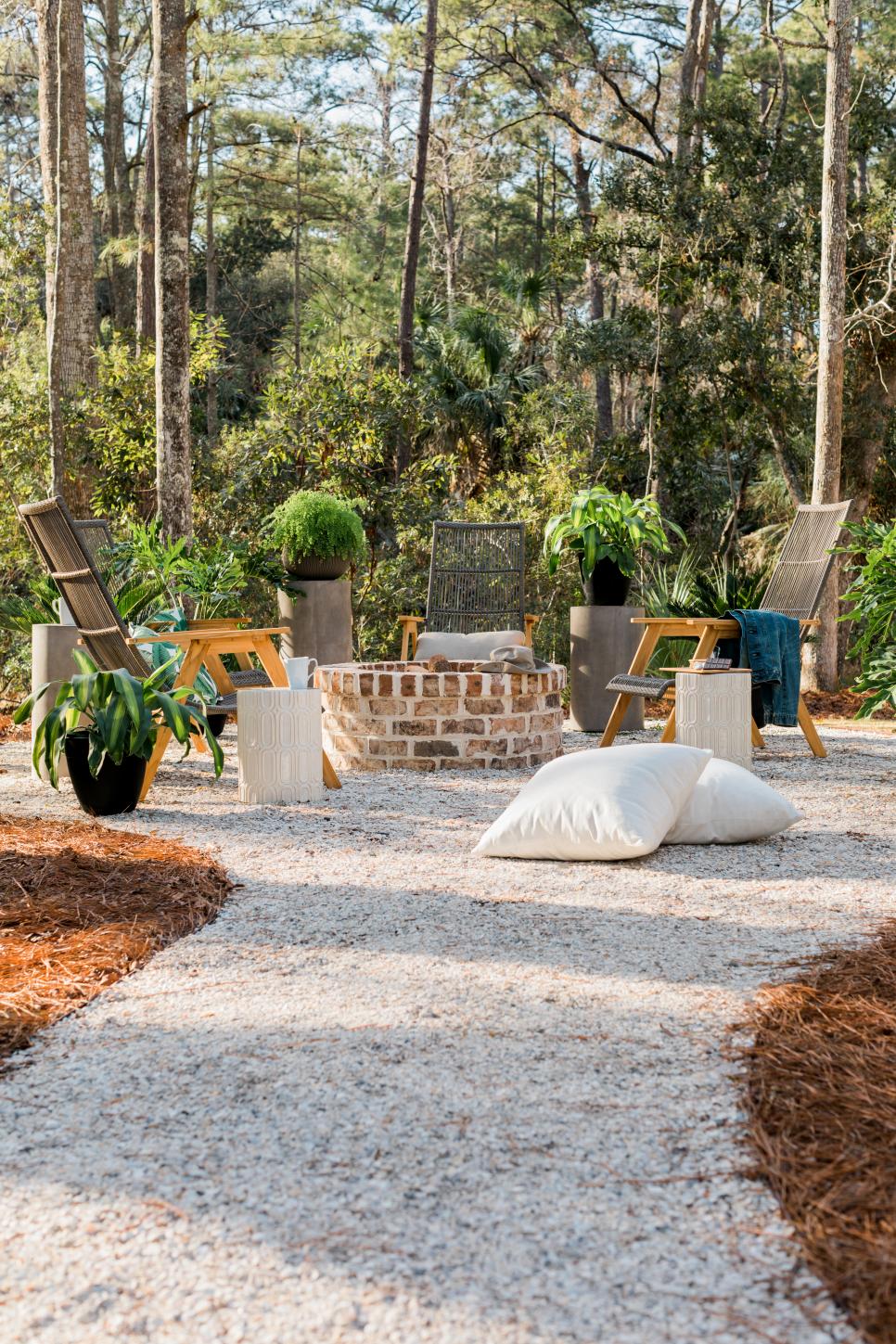 Concrete and Crushed Oyster Shell Walkway Leads to Fire Pit | HGTV