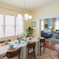 Contemporary Yellow Dining Room with Neutral Window Treatments 