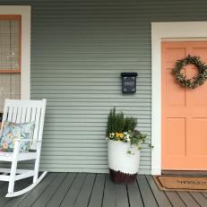 Contemporary Gray Front Porch with Coral Front Door 