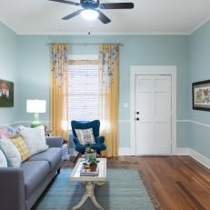 Rustic Blue Living Room with Hardwood Brown Floor