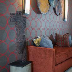 Orange Velvet Sofa and Dot Wallpaper