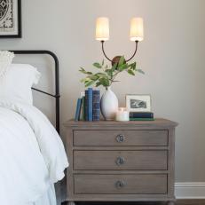 White Cottage Master Bedroom with Neutral Wood Nightstand 