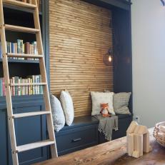 Blue Cottage Playroom with Neutral Shiplap Accent Wall 