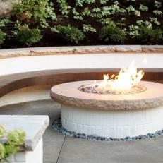 Fire Pit and Floating Bench in Backyard