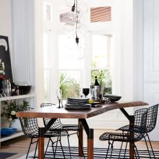 Black and White Dining Room With Metal Chairs