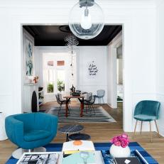 White Living Room With Blue Chairs