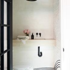 Black and White Powder Room With Wavy Stripes