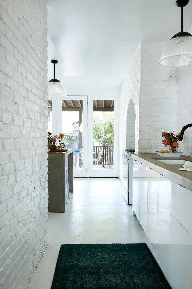 White Kitchen With White Brick Walls | HGTV