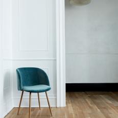 Blue Velvet Chair in Corner