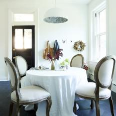 White Dining Area With Traditional Chairs