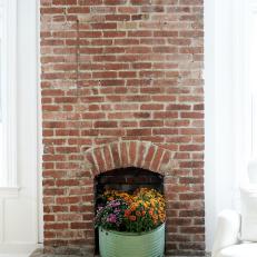 Brick Fireplace and Flowers