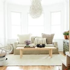 White Contemporary Living Room With Wood Table