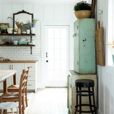 White Country Kitchen With Black Stool