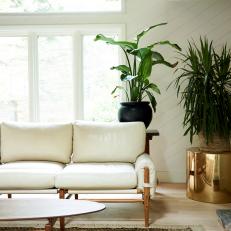 White Midcentury Living Room With Gold Table