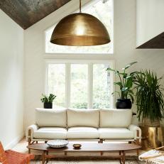 Neutral Contemporary Living Room With Gold Pendant
