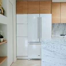 White Refrigerator and Wood Cabinets
