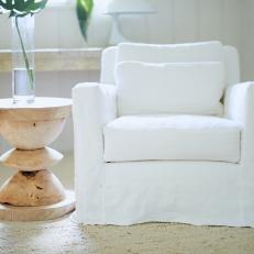 White Armchair and Wood Side Table