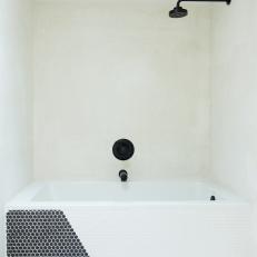 Bathtub With Black-and-White Mosaic Tiles