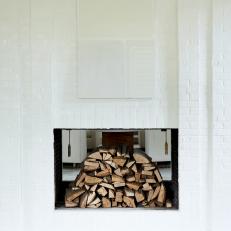 White Brick Fireplace and Logs