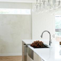 White Modern Open Plan Kitchen With Pears