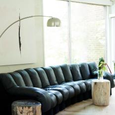 Black Leather Sofa and Tree Tables