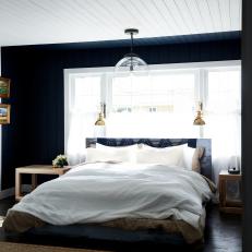 Blue and White Eclectic Bedroom With Globe Light