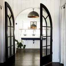 White Country Bathroom With Black French Doors