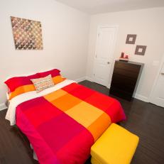 Contemporary Neutral Bedroom with Red, Orange and Yellow Bed Linen