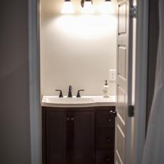 Contemporary Neutral Master Bathroom with Brown Wood Vanity 