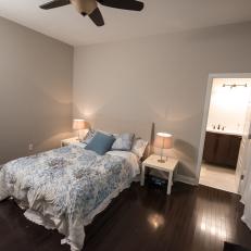Contemporary Neutral Master Bedroom with Brown Hardwood Floors