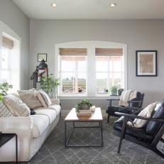 Contemporary Neutral Living Room with Large White Windows 
