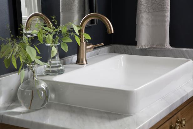 As seen on Fixer Upper, the Morrison's renovated guest bathroom has a new sink. (After)