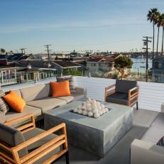 Roof Deck Seating Area With Orange Pillows