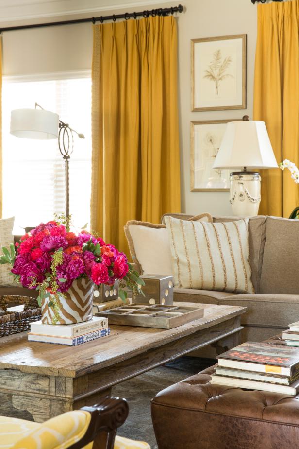 Neutral Transitional Living Room With Yellow Curtains | HGTV