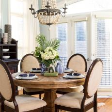 Transitional Dining Area With Rustic Rug