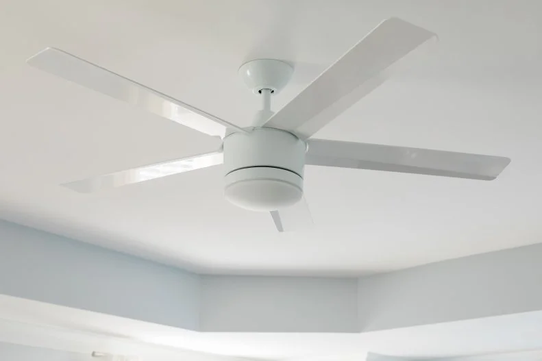 Light fixtures and fans don’t have to break the bank OR make an outrageous style statement. Skip the fancy budget-obliterating fixtures and go with an understated fan that blends into the room’s ceiling. HINT: Get one with a remote for easy on/off when you’re already snuggled into bed! 