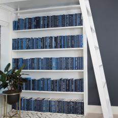 Modern Blue Home Office with White Bookshelf 