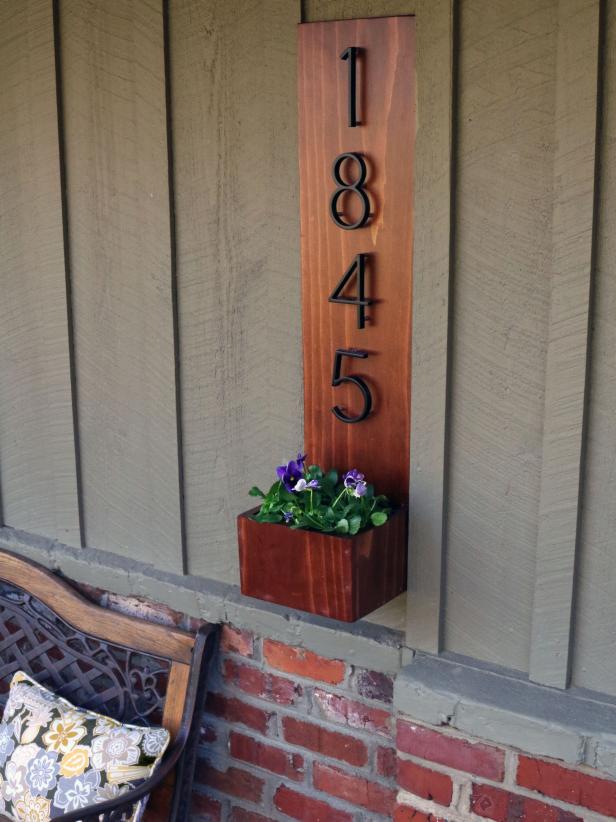 An address display and wall planter will brighten your front porch.