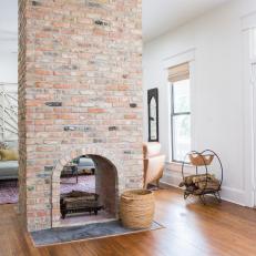 Contemporary Neutral Dining Room with Brown Brick Fireplace 