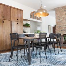 Contemporary Neutral Dining Room with Black Dining Chairs 